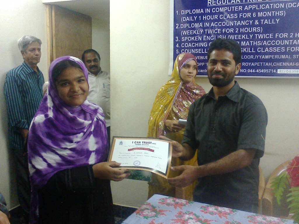 Sister of B. Gathija Banu receiving the Second Prize Certificate